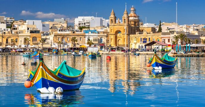 Traditional fishing boats in the Mediterranean Village of Marsaxlokk, Malta