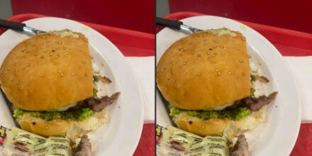 hamburger met vinger